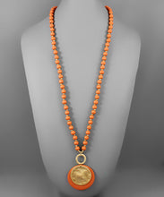 Load image into Gallery viewer, Layered Disc Bead Necklace
